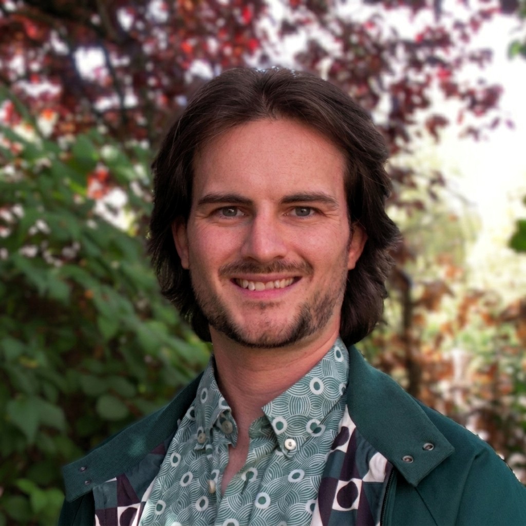 Portrait of Dr Olly Bartlett